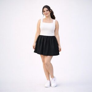 Antonio Melani Active Black& White Bubble Hem Athletic Dress (L )Two
Pockets NWT